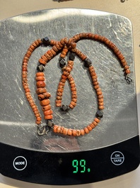 A varied group of five Tibetan necklaces, three rings and four earbobs with red coral, 19/20th C.