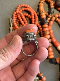 A varied group of five Tibetan necklaces, three rings and four earbobs with red coral, 19/20th C.