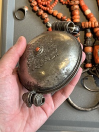 A varied group of five Tibetan necklaces, three rings and four earbobs with red coral, 19/20th C.