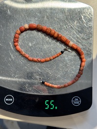 A varied group of five Tibetan necklaces, three rings and four earbobs with red coral, 19/20th C.