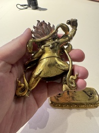 A Sino-Tibetan gilt-bronze Mahakala on stand, a Tibetan Vajradhaka and a Hayagriva, 19/20th C.