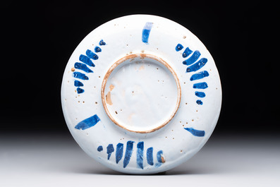 A blue, white and manganese Nevers Transitional style chinoiserie dish, France, 17th C.