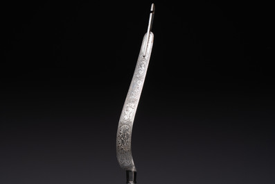 An Indo-Persian steel ceremonial bow or 'arc en acier' with silver koftgari inlay, 18/19th C.