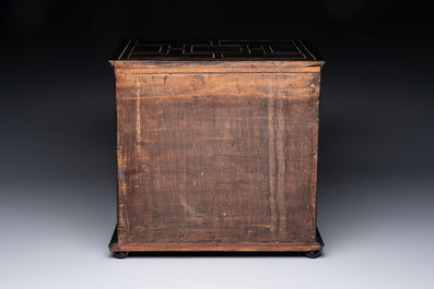 A small tortoiseshell-veneered cabinet of drawers with mirrored interior, Antwerp, 17th C.