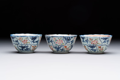 Eleven Chinese famille rose cups and nine saucers, Yongzheng/Qianlong
