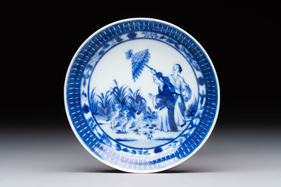 A rare Chinese blue and white 'Dames au Parasol' cup and saucer after Cornelis Pronk, Qianlong, ca. 1738