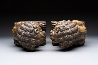 A pair of Chinese carved stone Buddhist lions, a large seal and a wooden box with four seals, 20th C.