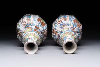A pair of polychrome Dutch Delft double gourd vases, 19th C.