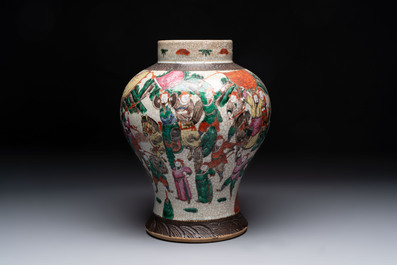 Two Chinese Nanking famille verte covered vases and a famille rose vase, 19th C.