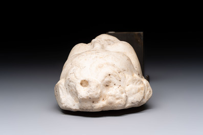 A marble 'putto head' fountain spout, France or Italy, 19th C. or earlier