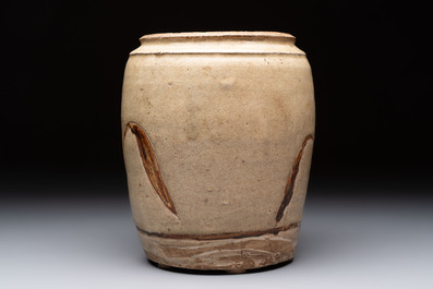 An Annamese or Vietnamese brown-glazed cream-ground 'grass sprigs' jar, 12/13th C.