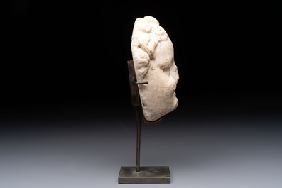 A marble 'putto head' fountain spout, France or Italy, 19th C. or earlier