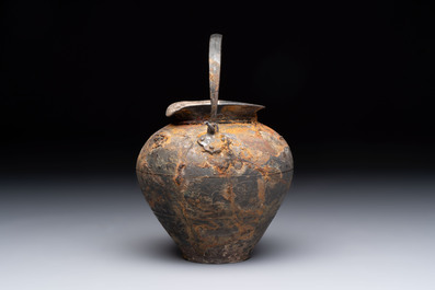 A rare Chinese parcel-gilt silver handled jar with floral scroll design, Tang