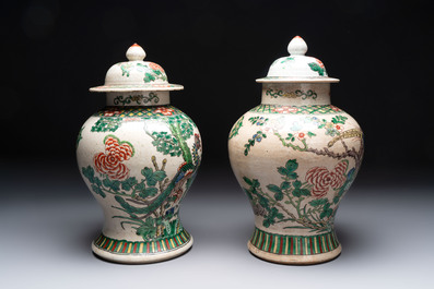 Two Chinese Nanking famille verte covered vases and a famille rose vase, 19th C.