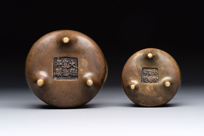 Two Chinese bronze tripod censers, Xuande marks, 19th C.