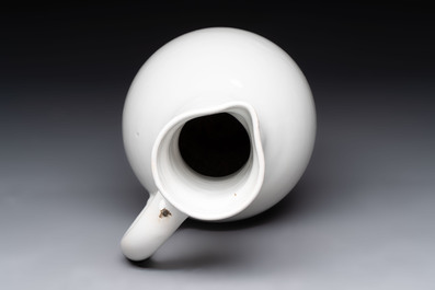 A white-glazed Delftware wine jug, early 18th C.