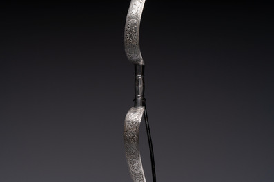 An Indo-Persian steel ceremonial bow or 'arc en acier' with silver koftgari inlay, 18/19th C.