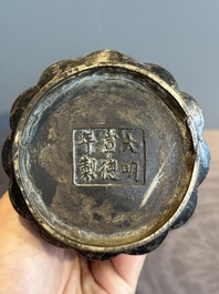 A Chinese bronze 'gu' vase with chilong, Xuande mark, late Ming/early Qing