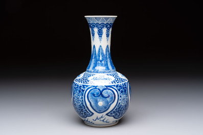 A Chinese blue and white vase with floral design, 19th C.