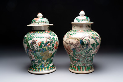 Two Chinese Nanking famille verte covered vases and a famille rose vase, 19th C.