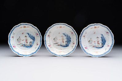 Eleven Chinese famille rose cups and nine saucers, Yongzheng/Qianlong