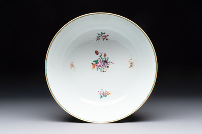 A Chinese famille rose armorial bowl with the arms of Troutbeck for the English market, Qianlong, ca. 1775
