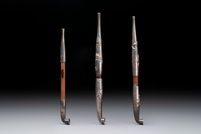 Three Japanese parcel-gilt silver and wooden 'Kiseru' or tobacco pipes, 19/20th C.