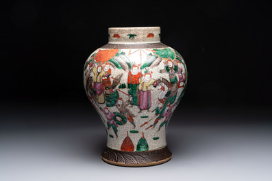 Two Chinese Nanking famille verte covered vases and a famille rose vase, 19th C.