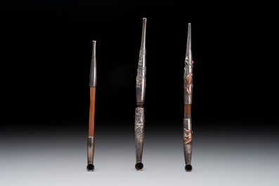 Three Japanese parcel-gilt silver and wooden 'Kiseru' or tobacco pipes, 19/20th C.