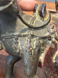 A rare Chinese partly gilt-lacquered bronze horse-from incense holder, Yuan/early Ming