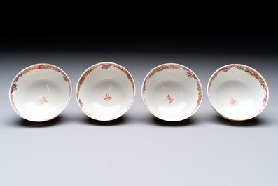 A set of four Chinese famille rose cups and saucers with horses, Qianlong