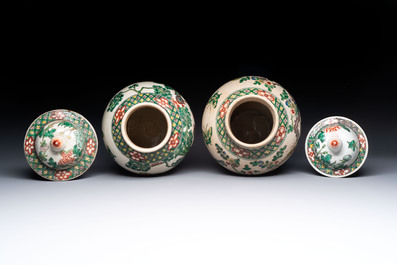 Two Chinese Nanking famille verte covered vases and a famille rose vase, 19th C.