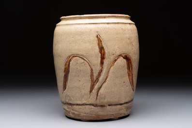 An Annamese or Vietnamese brown-glazed cream-ground 'grass sprigs' jar, 12/13th C.