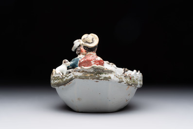 A cold-painted white Dutch Delft 'rowing boat' group, 18th C.