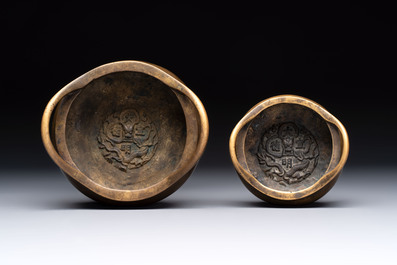 Two Chinese bronze tripod censers, Xuande marks, 19th C.
