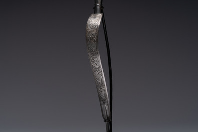 An Indo-Persian steel ceremonial bow or 'arc en acier' with silver koftgari inlay, 18/19th C.