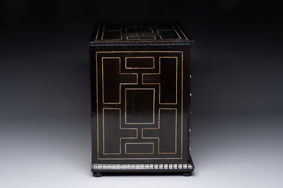 A small tortoiseshell-veneered cabinet of drawers with mirrored interior, Antwerp, 17th C.