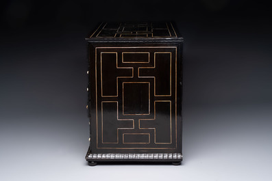 A small tortoiseshell-veneered cabinet of drawers with mirrored interior, Antwerp, 17th C.