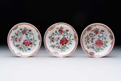 Eleven Chinese famille rose cups and nine saucers, Yongzheng/Qianlong