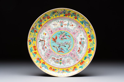 Three Chinese famille rose dishes, two plates and a saucer, various marks, 19th C.