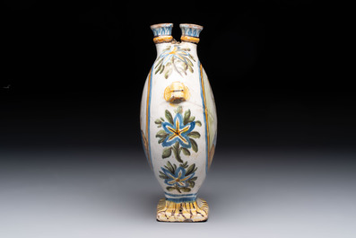 A polychrome Italian maiolica pilgrim bottle with two portrait busts, Castelli, 18th C.