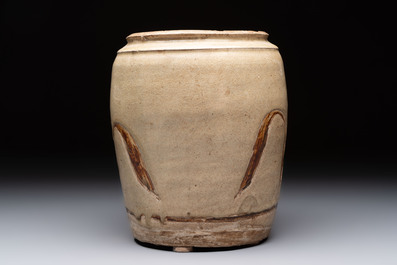 An Annamese or Vietnamese brown-glazed cream-ground 'grass sprigs' jar, 12/13th C.