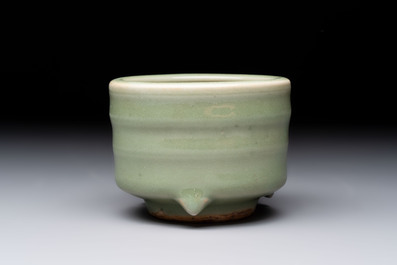 A small Chinese Longquan celadon cylindrical tripod censer, Ming