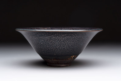 A rare Chinese black-glazed 'oil-spot' tea bowl, Song/Jin
