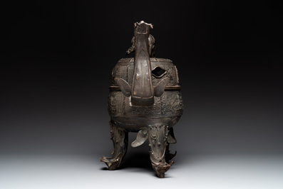 A massive Chinese archaistic bronze 'elephant' censer and cover, Ming
