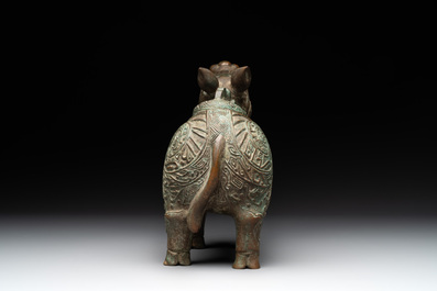 A rare Chinese inscribed bronze tapir-form vessel and cover, 'xizun 犧尊', late Ming/early Qing