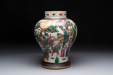 Two Chinese Nanking famille verte covered vases and a famille rose vase, 19th C.