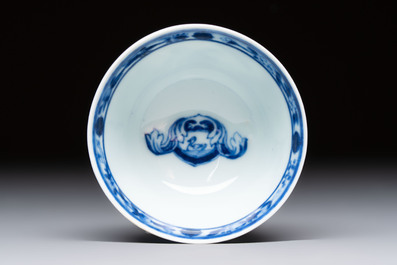 A rare Chinese blue and white 'Dames au Parasol' cup and saucer after Cornelis Pronk, Qianlong, ca. 1738