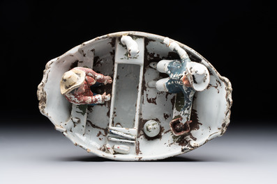 A cold-painted white Dutch Delft 'rowing boat' group, 18th C.