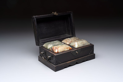 A pair of Chinese carved stone Buddhist lions, a large seal and a wooden box with four seals, 20th C.